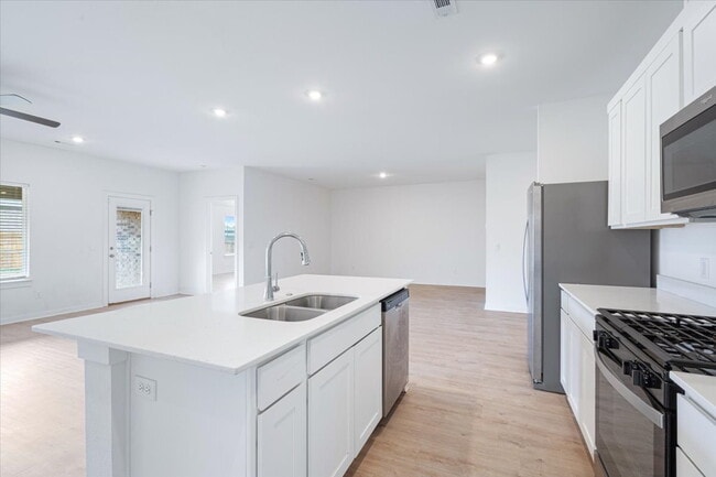 Photo - "Charming 4-Bedroom Gem with Granite Elega...