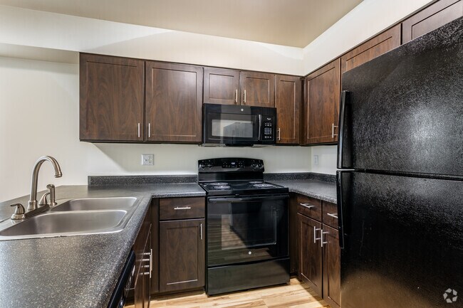 The Dover With Fireplace - Kitchen - Albion Court Apartments