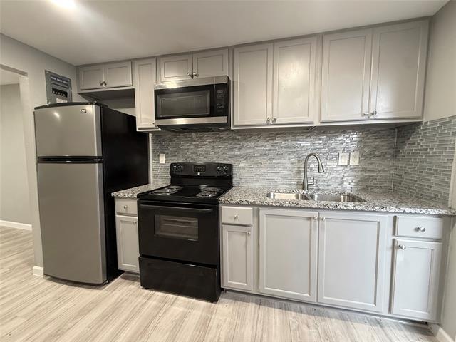 Building Photo - 1420 W 6th St Unit D