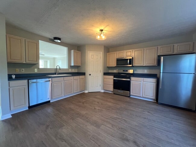 Photo - Charming 3-Bedroom Home with Modern Upgrad...