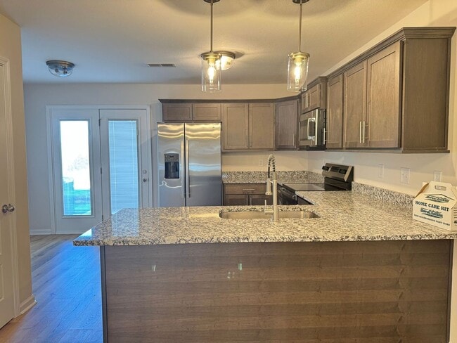 Photo - New Construction in the Heart of St. B! 2BR/2.5BA Minutes from the Best Shopping, Dining, and I-2...
