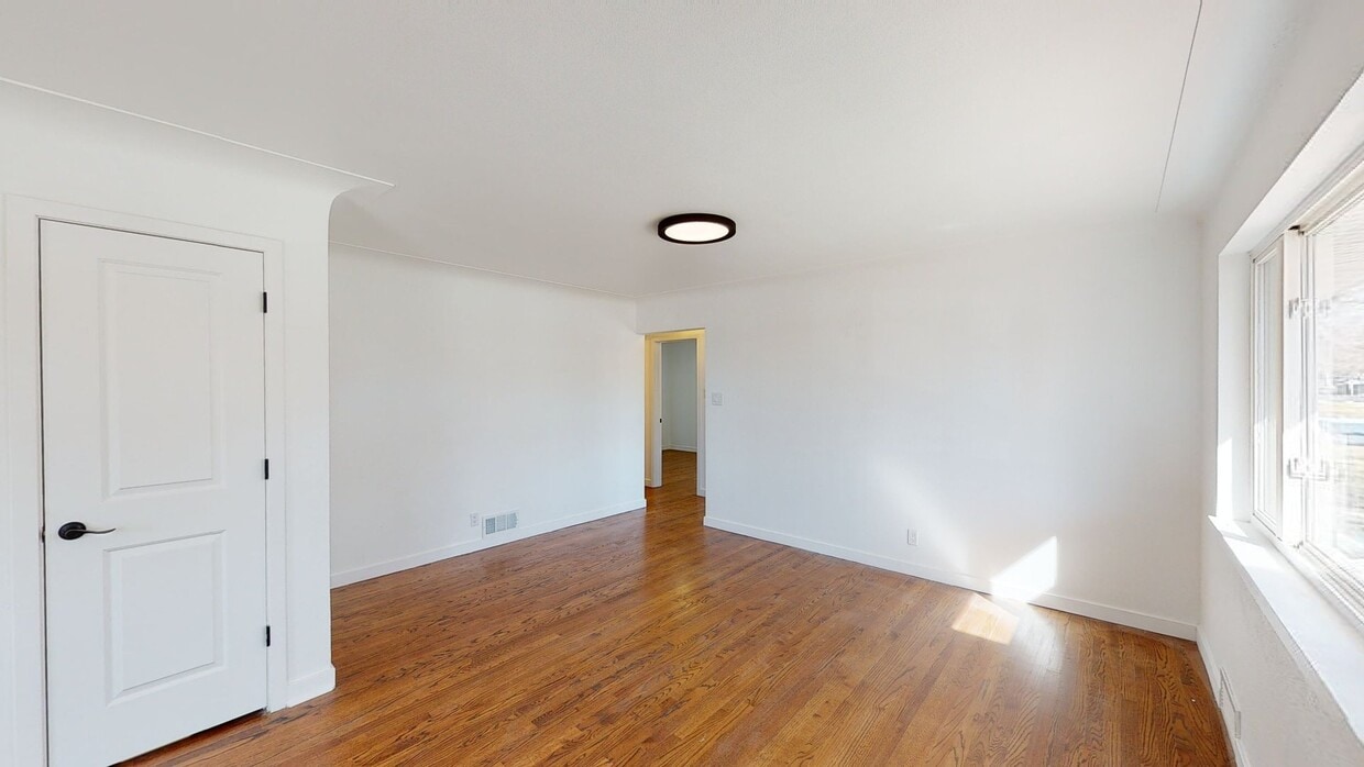 Photo - Classic brick Montclair home with covered ...