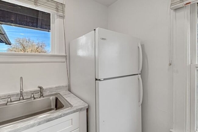 Photo - Renovated Upstairs 2-Bedroom, 2-Bath Apartment in Prime Downtown Location with 2 Office Spaces!