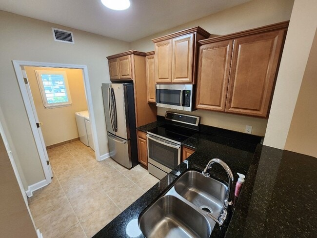 Photo - Beautiful 2/2 Bouchelle Condo with private garage