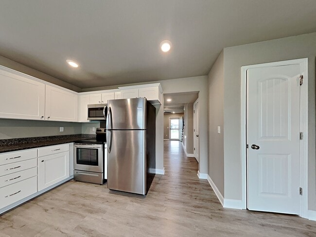 Photo - 3 BR/2.5BA | Newly Renovated Single Family Home | 1-Car Garage Parking | Community Pool!