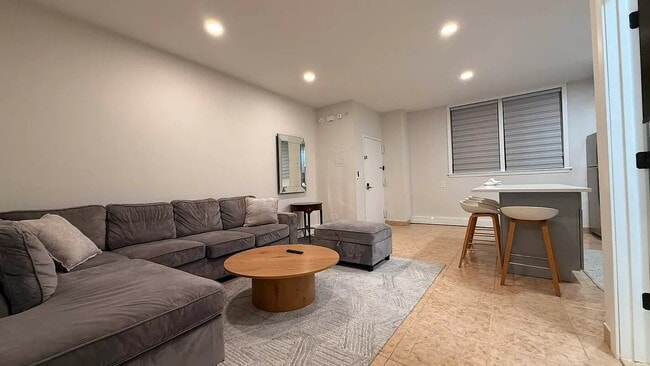 Photo - "Charming 1-Bedroom Furnished Apartment with Hardwood Floors in Queens – 750 Sq Ft of Comfort!"