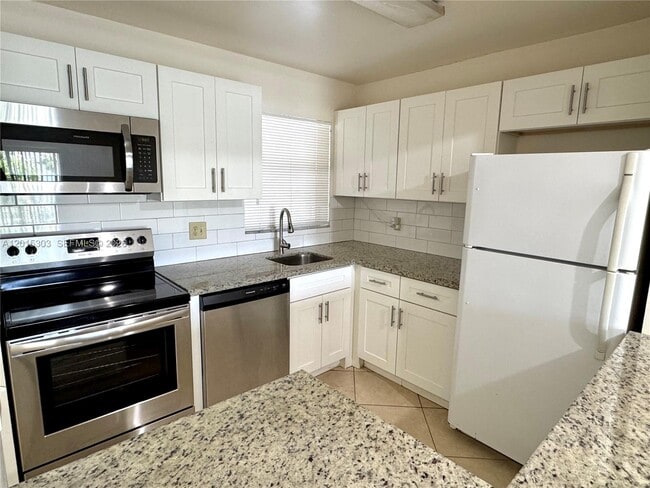 Building Photo - 6900 Nova Dr Unit 204-2