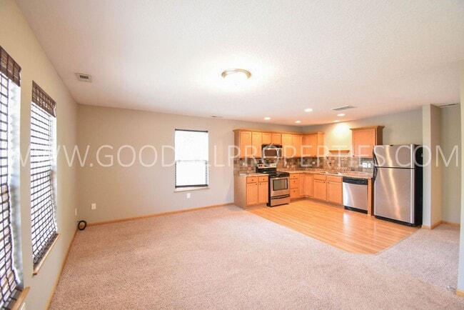 Photo - Experience the charm of this 2-bedroom, 2-bathroom townhome in Ankeny with an attached 2 car garage!