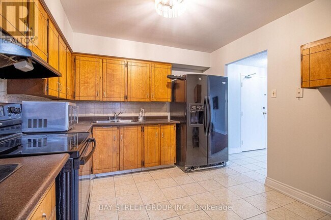 Photo - 1705 McCowan Rd Unité 210