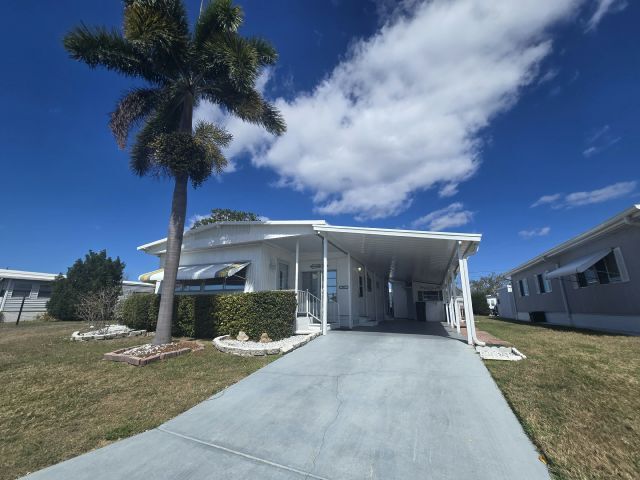 Building Photo - 303 50th Avenue Plaza W