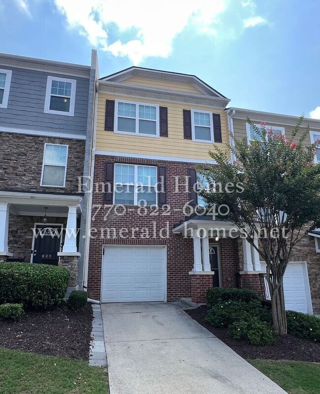Building Photo - Spacious 2-Bedroom Townhome with Finished Studio Suite – Prime Location!