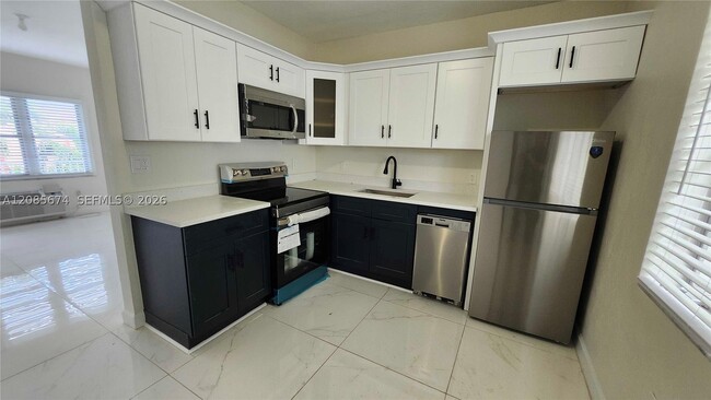 Building Photo - 847 81st St Unit 6