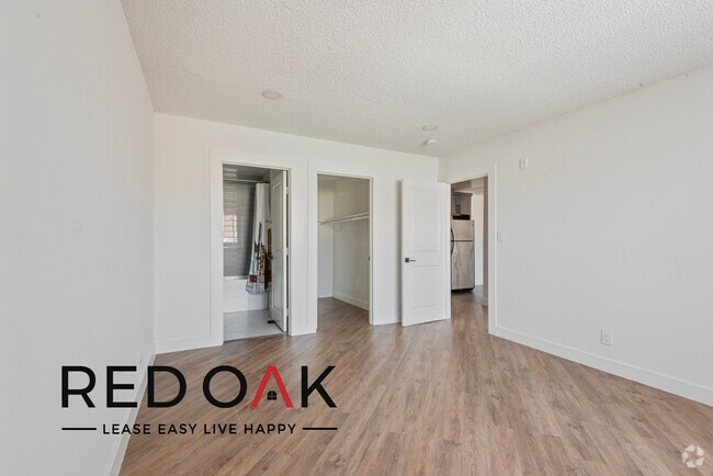 Building Photo - Beautiful and Bright Two Bedroom with Hard... Unit 203 Rental