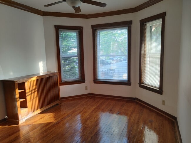 Living room 1 - 7755 S South Shore Dr Apartments