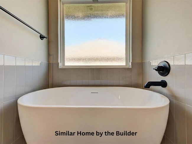 Photo - Brand-New 4-Bedroom Home with Modern Finishes & 3-Car Garage in Mustang