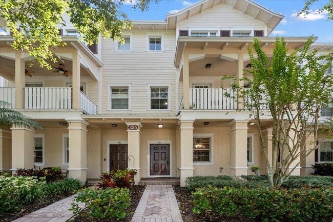 Building Photo - 335 E Thatch Palm Cir Unit 104