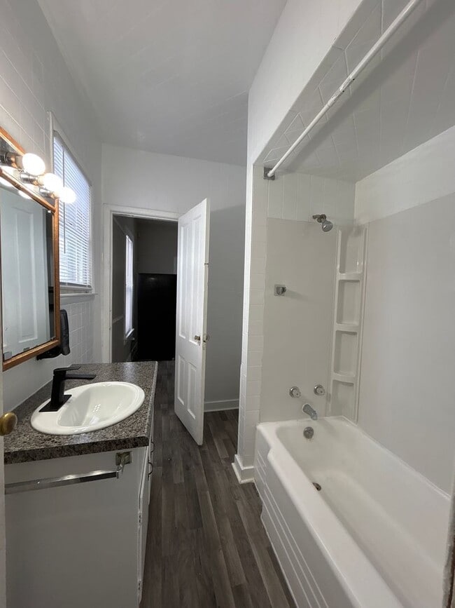 Photo - Remodeled 4-Bedroom, 1-Bathroom Home with Large Garage – $1,550/Month | Accepting Section 8