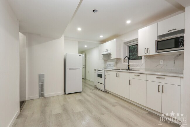 Photo - Rare 2 Bedroom Suite  in Great  Sardis Loc... Unit Basement