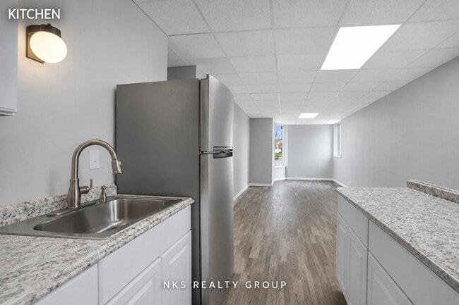 2718 E Grand River Ave Unit 2 private 1BR 1BA