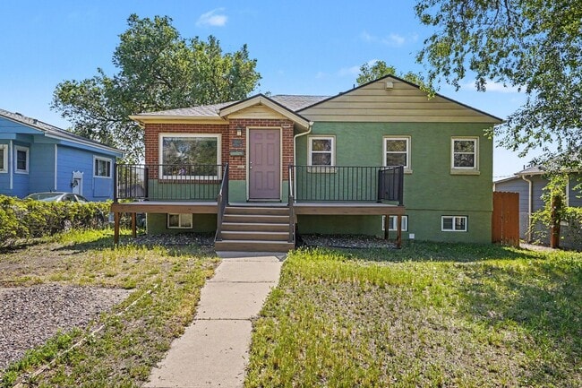 Building Photo - Spacious 4-Bedroom, 2-Bath Home with Large Yard, Garage & Central A/C