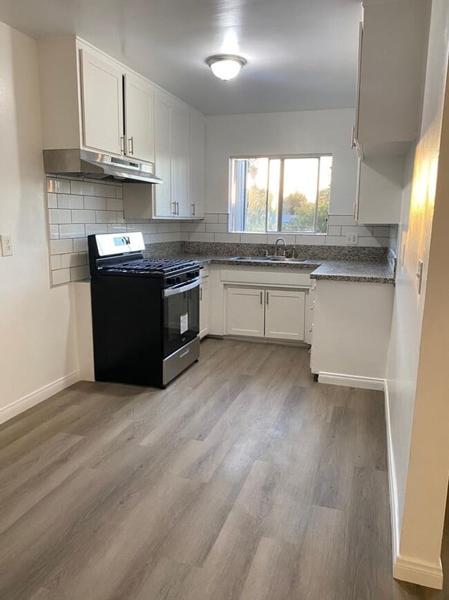 Photo - Discover Modern Living at 9215 Sepulveda Blvd, North Hills, CA