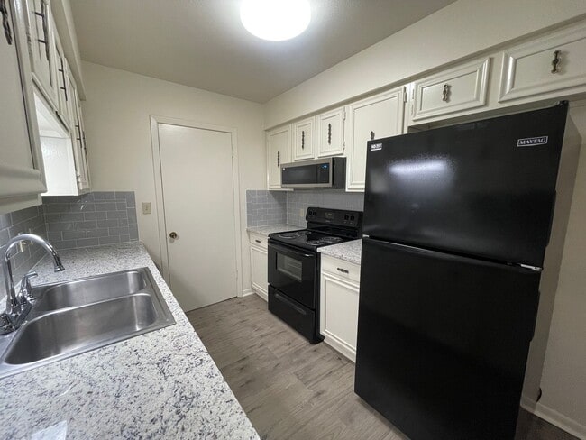 Photo - A Great Place to Call Home! Master Bedroom and Bath Downstairs!