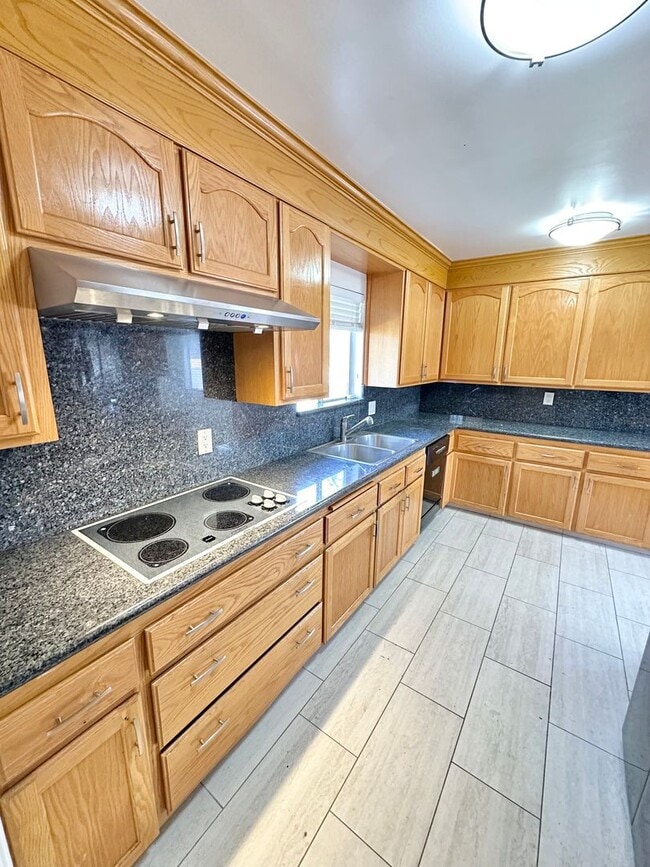 Photo - Spacious 4BD/2BA Two-Story Home with Yard, Fireplace & Parking in The Plaza