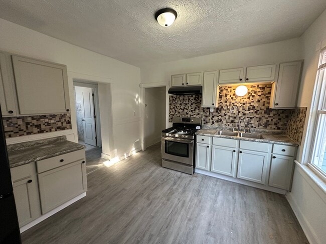 Building Photo - 3069 N 29th St Unit Upper