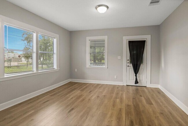 Photo - 3 bedroom - 2 bath. New paint, new plumbing and lighting fixtures, new bath vanities, new floorin...