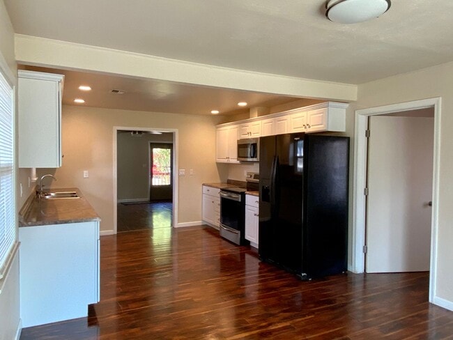 Photo - Charming 2bdrm, 1.bath house with garage, workshop space and large yard