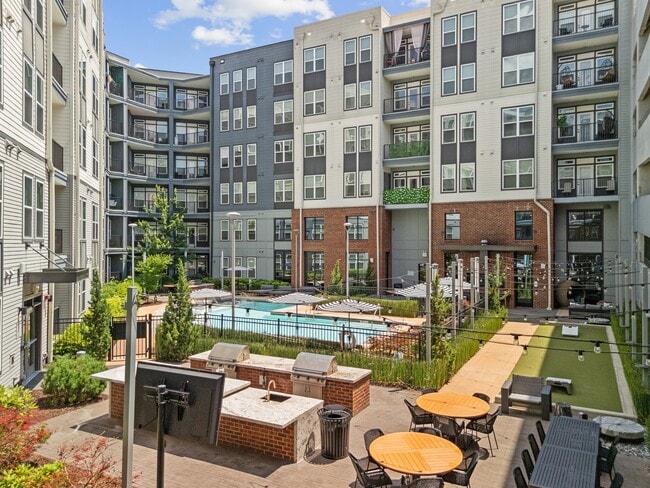 Resort-style Swimming Pool and Poolside Lounge and Grilling Areas