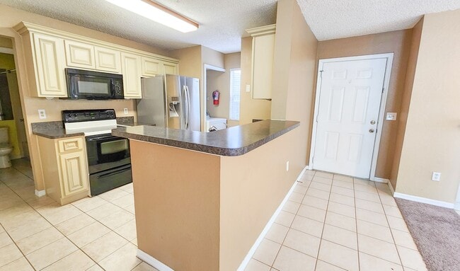 Photo - Beautiful 3 bdrm 2 bath botom floor condo available now! Unit 103