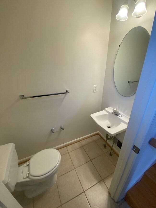 Photo - Application Fee Waived For Fall! A spacious three bedroom, two and one half bath townhouse locate...