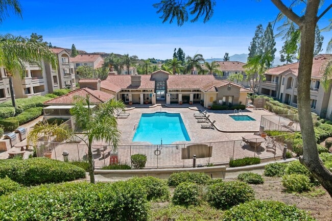 Photo - 1BR Condo with Private Balcony, Central A/C & Community Amenities in Corona