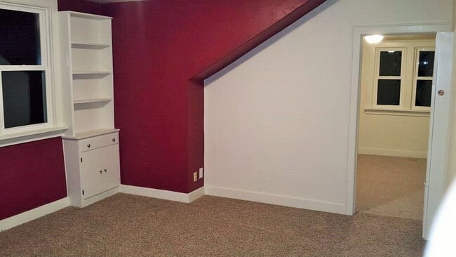 One of two bookcases in living room - 2119 N 11th St Unit 2119