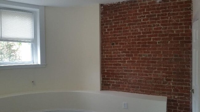 Photo - Nicely updated ground level 1 bed with in-unit laundry near the Green Line.