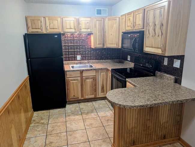 Photo - Spacious 1BR Condo – Pool Access & Utilities