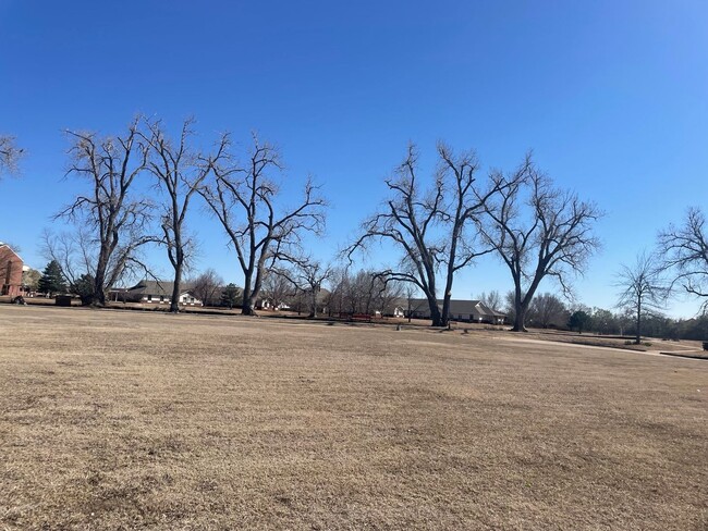 Photo - 55 and up community!!  2 bed flex floorplan with office, bright natural light throughout, 2 car g...