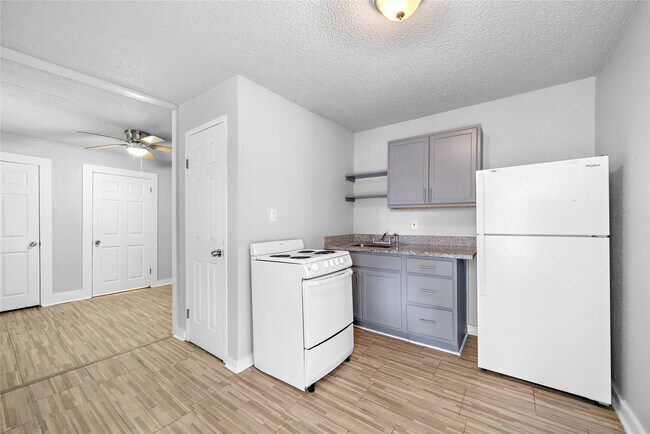 Building Photo - 3116 Avenue L Unit 8