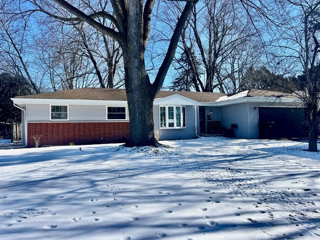 Building Photo - Spacious 4-Bedroom Home with Finished Basement & Garage