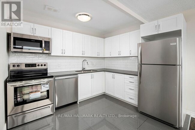 Photo - 3101 Eglinton Ave E Unité 110