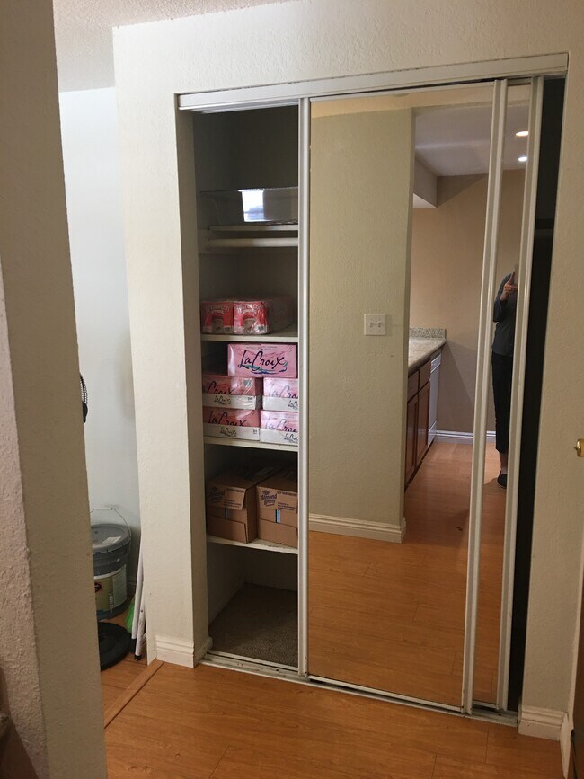 Pantry and coat closet off kitchen