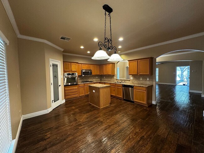 Photo - Spacious 5-Bedroom with Elegant Upgrades & Expansive Backyard in Trophy Ridge Subdivision