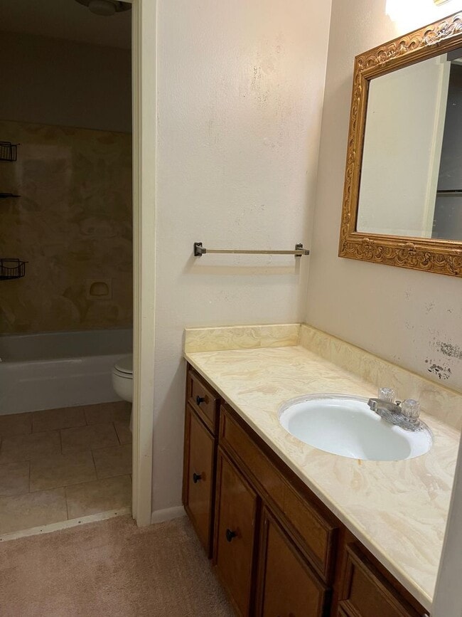 Photo - Introducing a 2-bedroom, 1.5-bathroom condo that offers the perfect blend of comfort and convenie...
