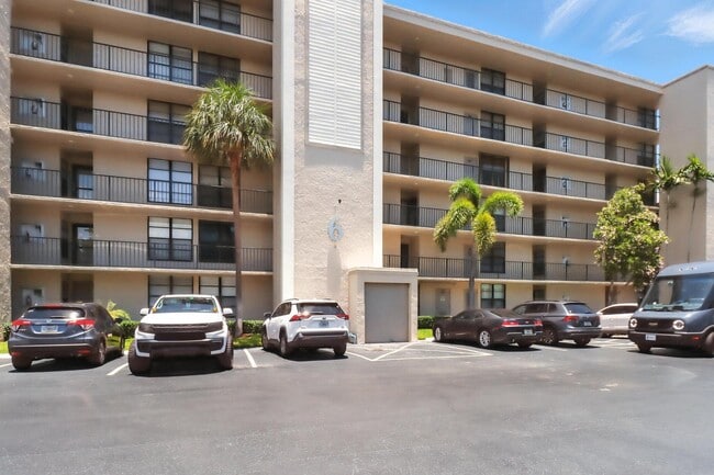 Building Photo - 6 Royal Palm Way Unit 105