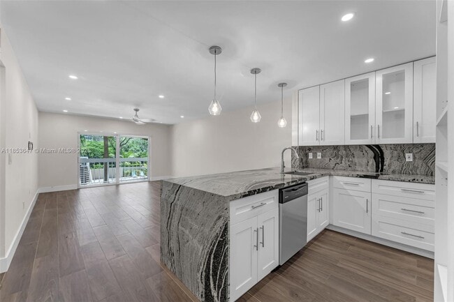 Building Photo - 7707 Camino Real Unit B205
