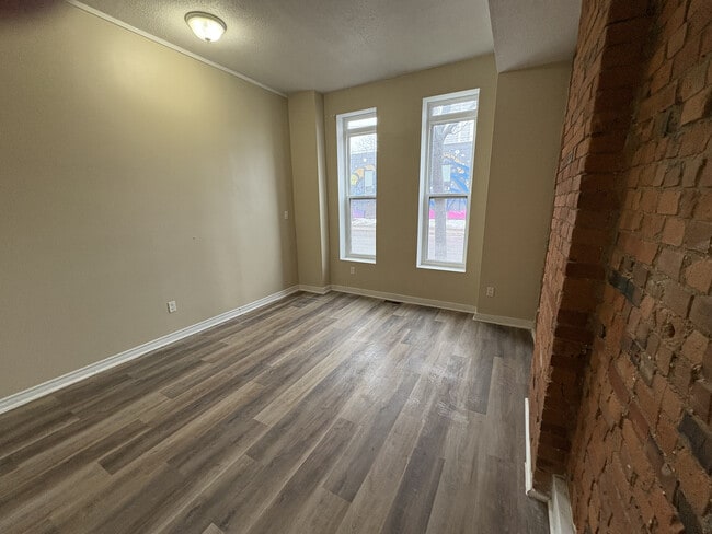 Photo - 1 Bedroom Main Floor With In-suite Laundry and Parking Unit 1