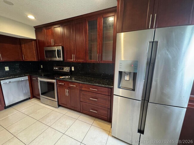 Photo - 8781 Wiles Rd Unit 302