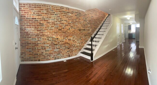 Entry way ft Brick face - 418 N Bradford St Townhome