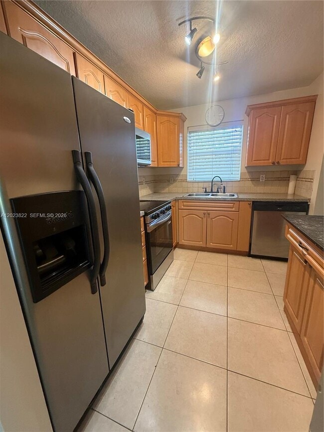 Photo - 5080 SW 64th Ave Unit 104